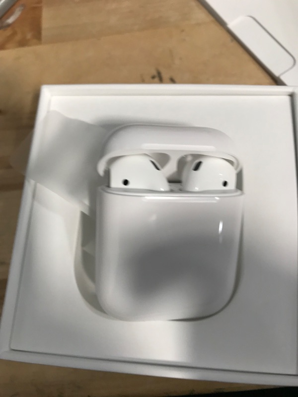 Photo 3 of Apple AirPods with Charging Case (Latest Model)