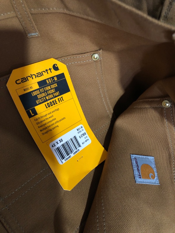 Photo 4 of Carhartt Men's Loose Fit Firm Duck Double-Front Utility Work Pant 42W x 32L Carhartt Brown