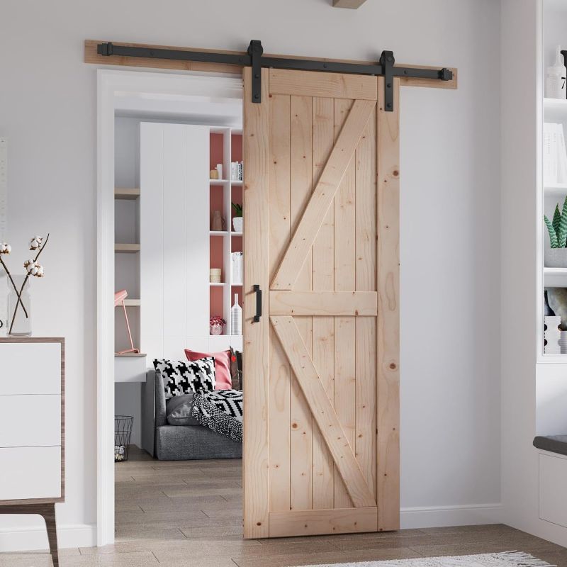 Photo 1 of 32in x 84in Sliding Barn Door with 5.5FT Barn Door Hardware Kit Included Wood K Shape Solid Spruce Wood Panel Need to Assembly COLOR WIHITE 
