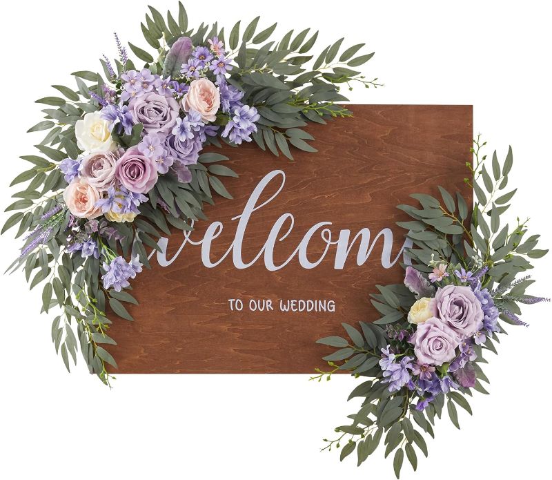 Photo 1 of Roselywed Wedding Arch Flowers Swag (Set of 2) Artificial Floral Swag for Welcome Sign Flower Decor & Wedding Arch Decoration for Reception Backdrop Floral Arrangements (Lilac) 