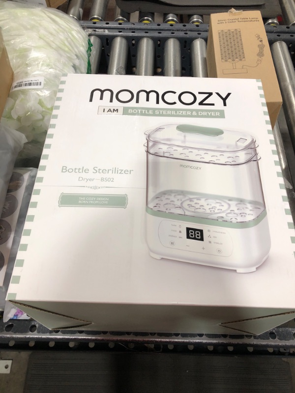 Photo 1 of momcozy bottle sterilizer and dryer 