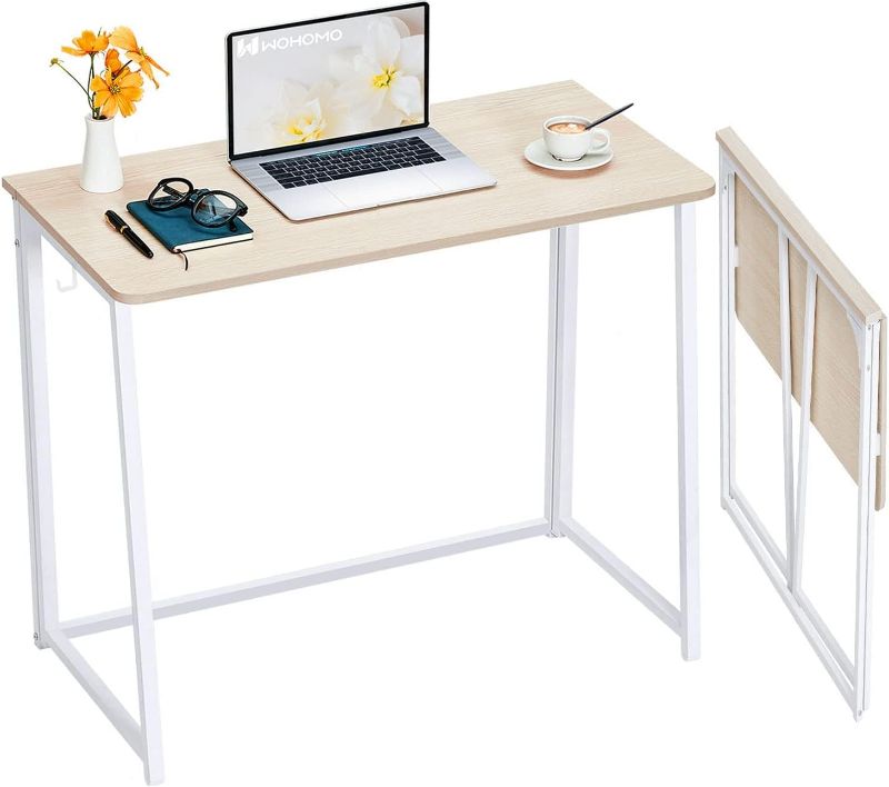 Photo 1 of WOHOMO Folding Desk, Small Foldable Desk 31.5" for Small Spaces, Space Saving Computer Table Writing Workstation for Home Office, Easy Assembly, Oak
