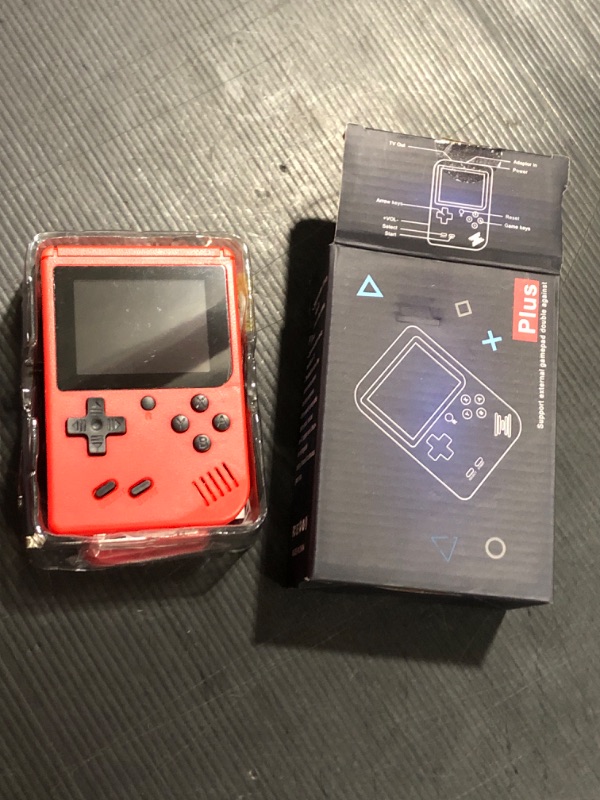 Photo 1 of Handheld Game Console-Portable Retro Video Game with 400 Classic FC Games, 2.8 Inch Color Screen, Support TV Connection & Two Players, 1020mAh Rechargeable Battery Present for Kids (RED)