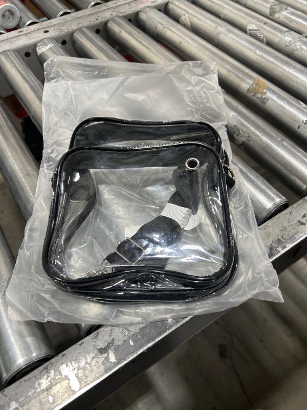 Photo 1 of STADIUM APRROVED CLEAR BAG WITH CARRY STRAP AND ZIPPER