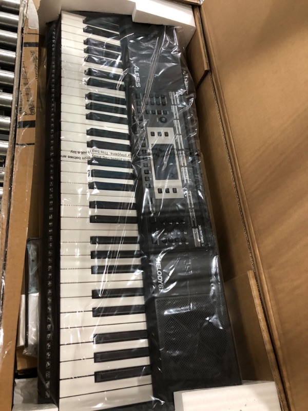 Photo 2 of Alesis Melody 61 Key Keyboard Piano for Beginners with Speakers, Digital Piano Stand, Bench, Headphones, Microphone, Music Lessons and Demo Songs