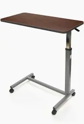 Photo 1 of adjustable overbed table 