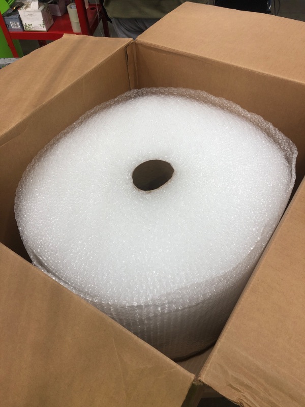 Photo 2 of Amazon Basics Perforated Bubble Cushioning Wrap - Small 3/16", 12-Inch x 175-Foot Long Roll & Amazon Basics Moving Boxes - Large, 20"x20"x15"/12 pack