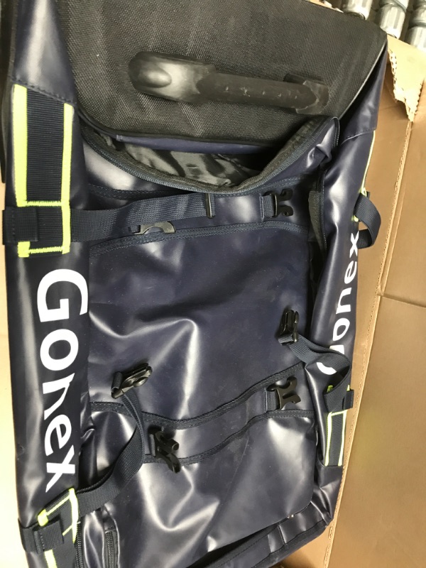 Photo 1 of Gonex Rolling Duffle Bag W Wheels, 70L 25" Water Repellent Large Wheeled Travel