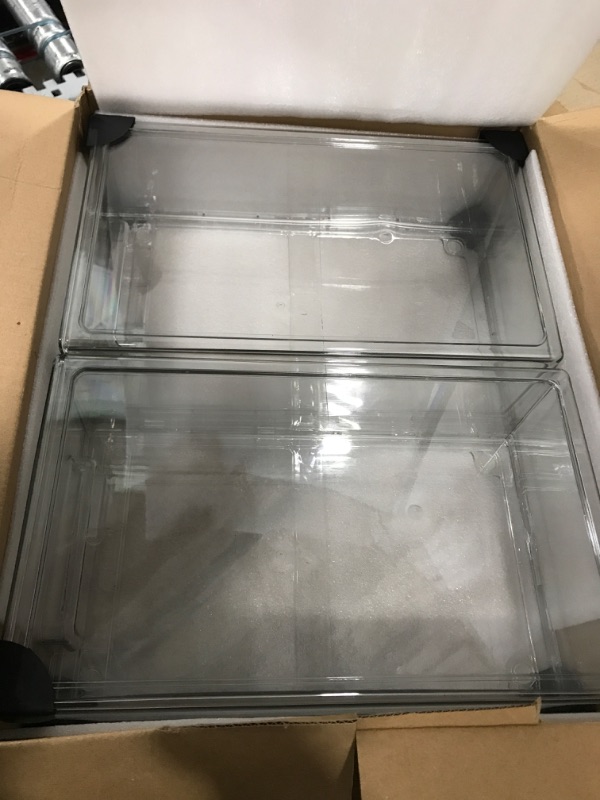 Photo 1 of 2 Clear Containers