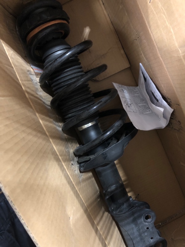 Photo 2 of *Not Exact* Monroe Quick-Strut 173123 Suspension Strut and Coil Spring Assembly