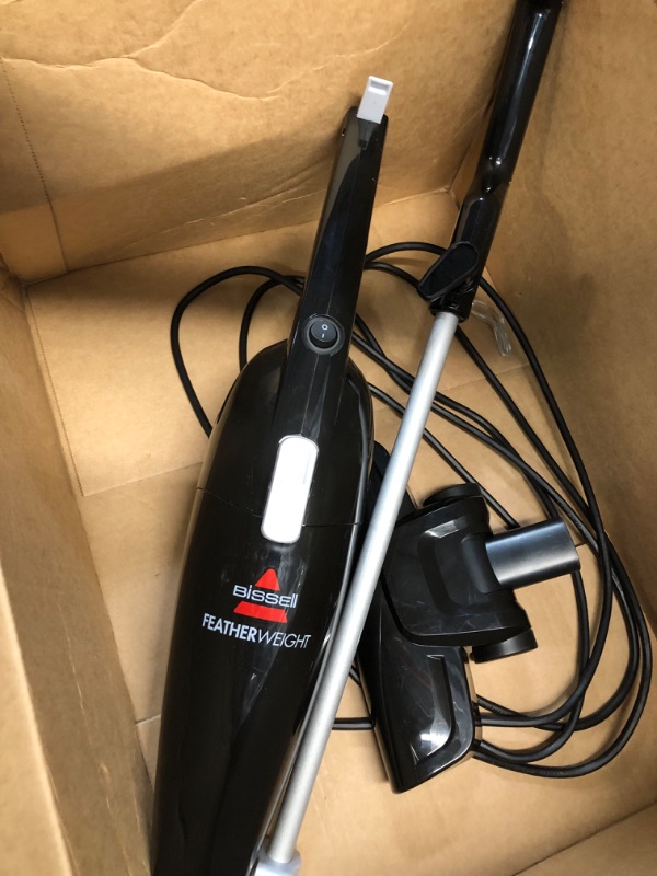 Photo 4 of BISSELL FeatherWeightâ Featherweight Stick Lightweight Bagless Vacuum with Crevice Tool, 2033M, Black