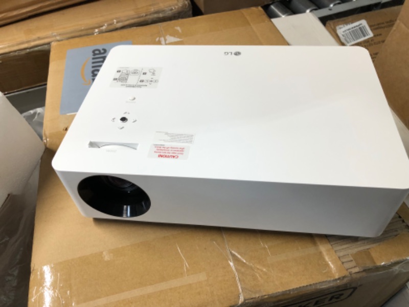 Photo 3 of *LIKE-NEW* LG HU70LA DLP 140" 4K UHD Smart Home Theater CineBeam Projector, Google/Alexa Assistance, LG webOS lite, Alexa Built-in, LG ThinQ AI, HDR10, 1500 ANSI lumens, Bluetooth, USB, Dual HDMI – White White Projector only