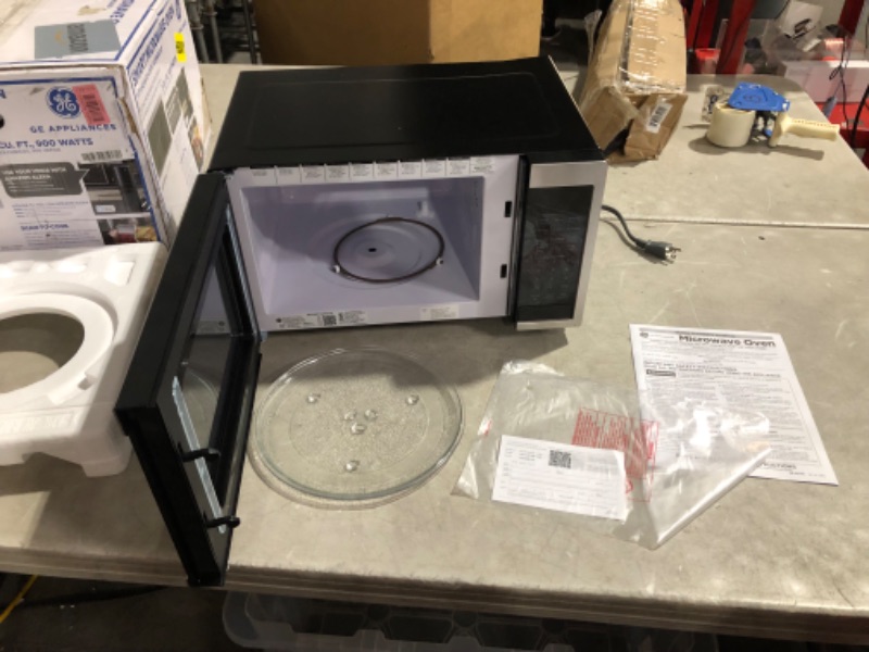 Photo 2 of ***NONREFUNDABLE - NOT FUNCTIONAL - FOR PARTS ONLY - SEE COMMENTS***
GE Smart Countertop Microwave Oven | Complete with Scan-to-Cook Technology and Wifi-Connectivity | 0.9 Cubic Feet Capacity, 900 Watts | Smart Home & Kitchen Essentials | Stainless Steel