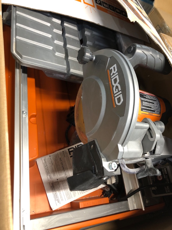 Photo 2 of **NONREFNDABLE**FOR PARTS OR REPAIR**SEE NOTES**
RIDGID 9 Amp Corded 7 in. Wet Tile Saw with Stand