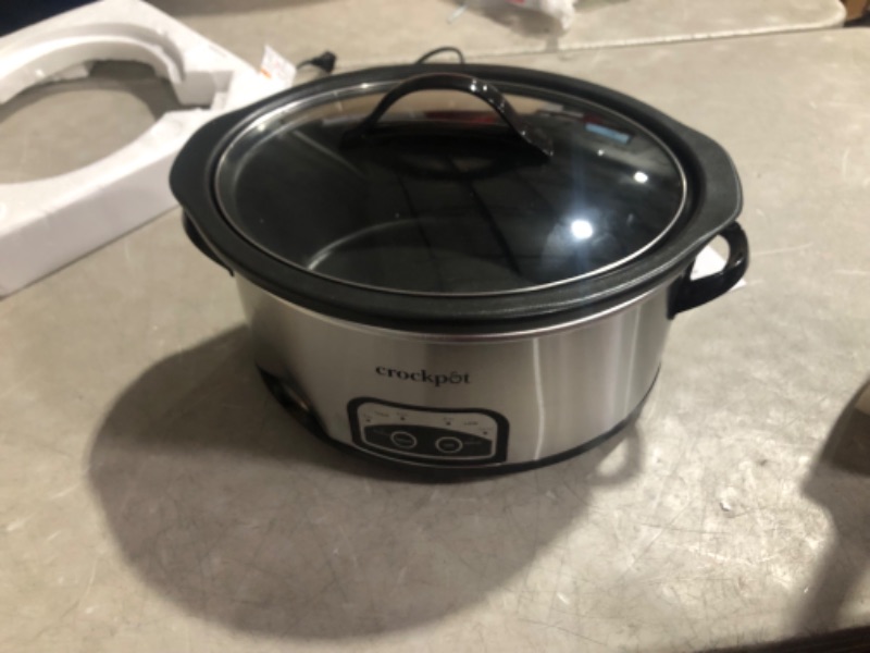 Photo 7 of ***DAMAGED - DENTED - POWERS ON - UNABLE TO TEST FURTHER***
Crockpot 6 Quart Slow Cooker with Auto Warm Setting and Programmable Controls, Stainless Steel