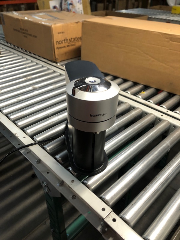 Photo 1 of Nespresso Vertuo Next Deluxe Compact and Slim-Fit Design Coffee and Espresso Machine for 6 Cup Sizes of Coffee (Pure Chrome)