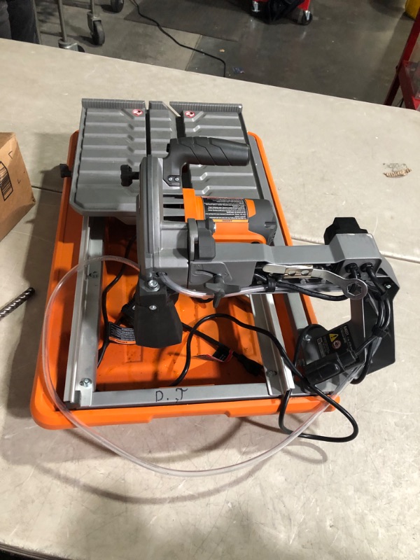 Photo 10 of *** STOCK PHOTO FOR REFERENCE ONLY | UNKNOWN IF MISSING PARTS *** 9-Amp 7 in. Blade Corded Wet Tile Saw with Stand
