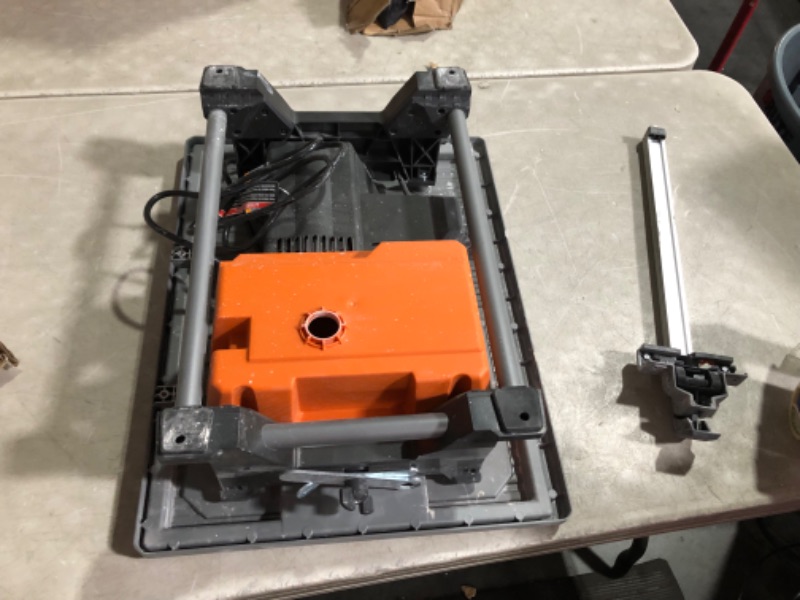 Photo 5 of ***HEAVILY USED - DIRTY - SAW PART MISSING - UNABLE TO VERIFY FUNCTIONALITY***
RIDGID 6.5-Amp 7 in. Blade Corded Table Top Wet Tile Saw