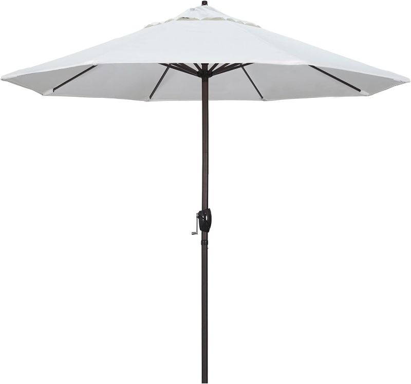 Photo 1 of 
California Umbrella 9' Round Aluminum Market Umbrella, Crank Lift, Auto Tilt, Bronze Pole, White Olefin