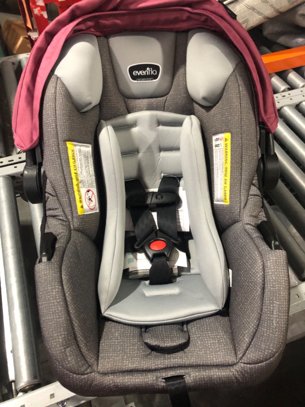 Photo 2 of **USED LIKE NEW**
Evenflo Pivot Modular Travel System with LiteMax Infant Car Seat with Anti-Rebound Bar (Dusty Rose Pink)