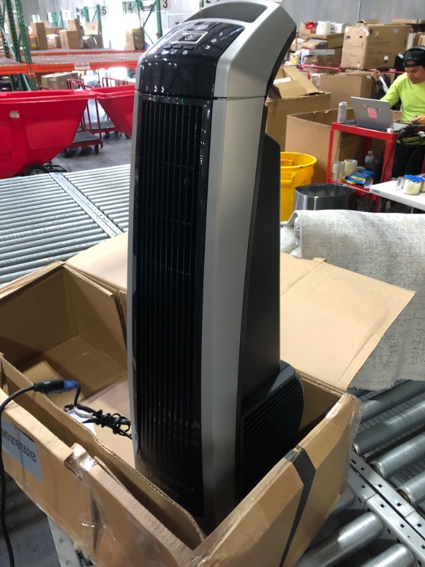 Photo 1 of **PLEASE READ NOTES**
Lasko Oscillating High Velocity Tower Fan