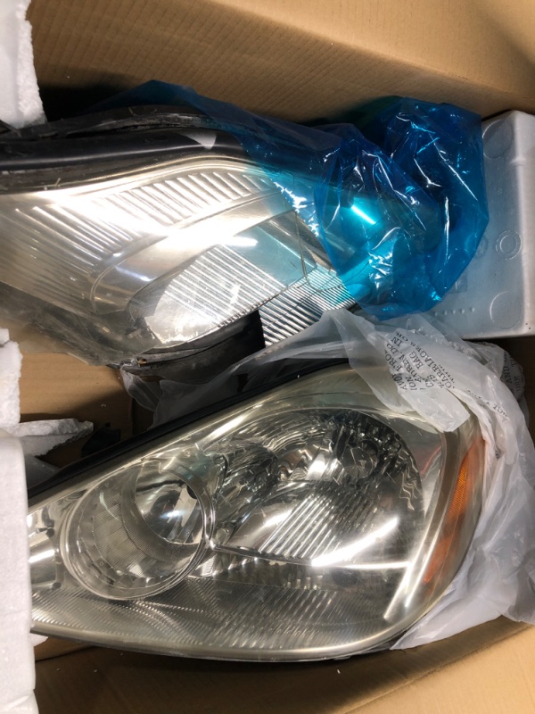 Photo 2 of **For parts only and nonrefundable**
ADCARLIGHTS Headlight Assembly for 2004 2005 Toyota Sienna Chrome Housing with Amber Reflector Left and Right