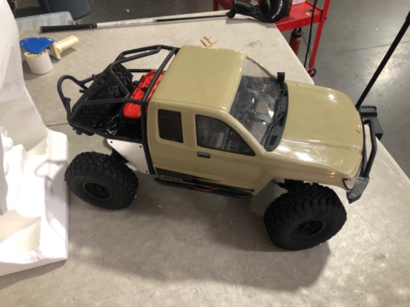 Photo 4 of **Minor damage**
Axial RC Crawler 1/6 SCX6 Trail Honcho 4WD RTR (Transmitter and Receiver Included, Battery and Charger Not Included), Red, AXI05001T1, Trucks Electric