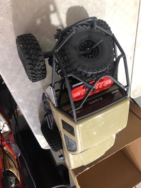 Photo 5 of **Minor damage**
Axial RC Crawler 1/6 SCX6 Trail Honcho 4WD RTR (Transmitter and Receiver Included, Battery and Charger Not Included), Red, AXI05001T1, Trucks Electric