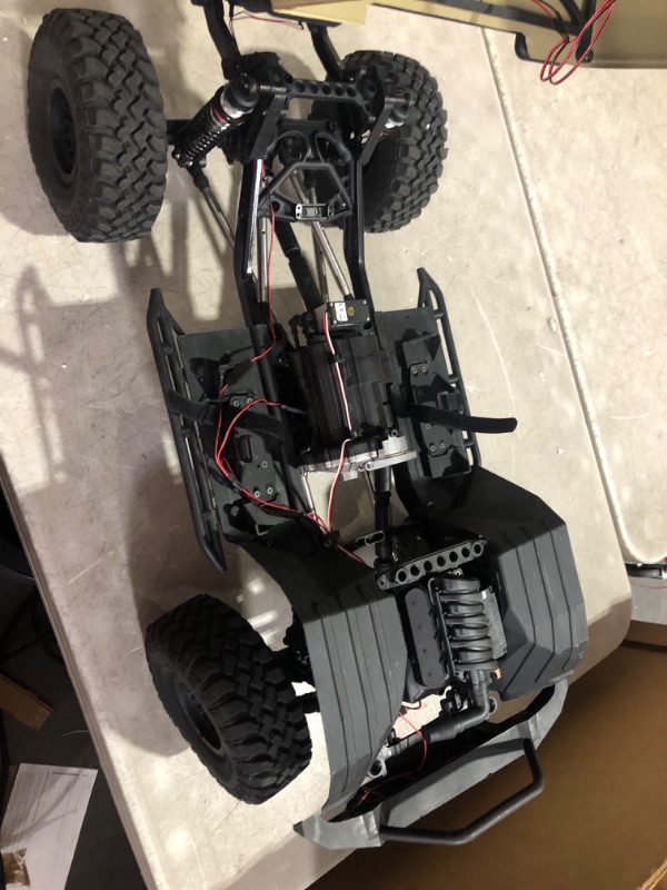 Photo 6 of **Minor damage**
Axial RC Crawler 1/6 SCX6 Trail Honcho 4WD RTR (Transmitter and Receiver Included, Battery and Charger Not Included), Red, AXI05001T1, Trucks Electric