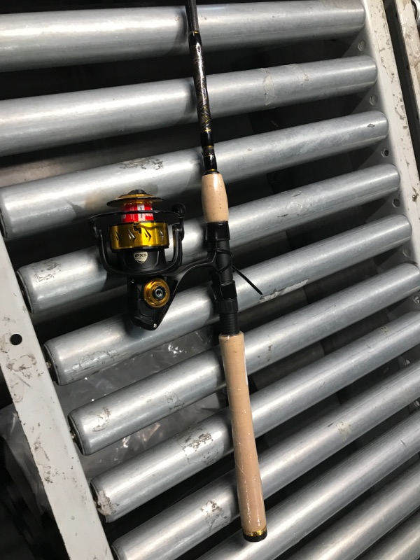 Photo 2 of **Broken Tip*** PENN 7' Spinfisher VII Spinning Fishing Rod & 4500 Reel Combo, 10-17lb Line Rating, Medium Power, IPX5 Sealing, CNC Gear Technology with Brass Main Gear, Black/Gold