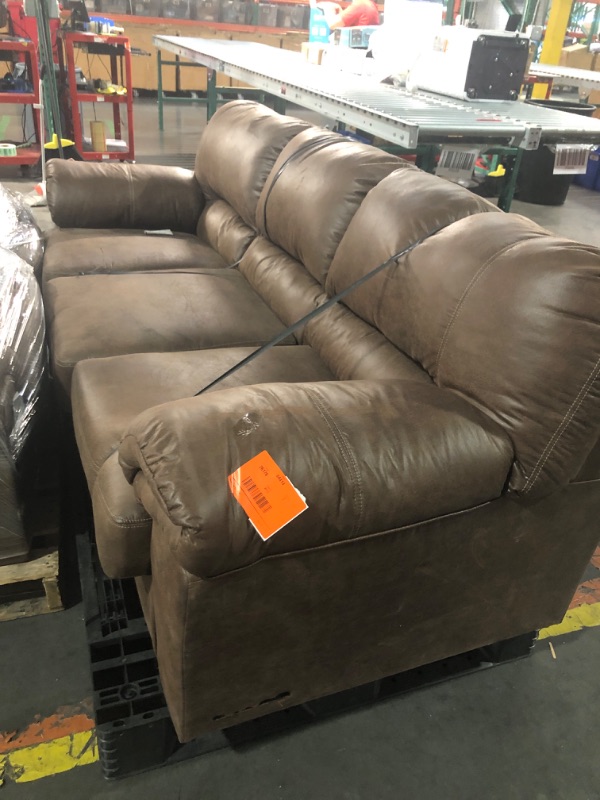 Photo 5 of *** SEE PHOTOS-MINOR HOLE IN THE BACKSIDE OF COUCH-MAJOR DAMAGE TO LOVE SEAT BASE- TRUCK/TRAILER PICKUP ONLY***
Signature Design by Ashley Bladen Faux Leather Full Sofa Sleeper, Brown WITH Signature Design by Ashley Bladen Faux Leather Loveseat, Brown