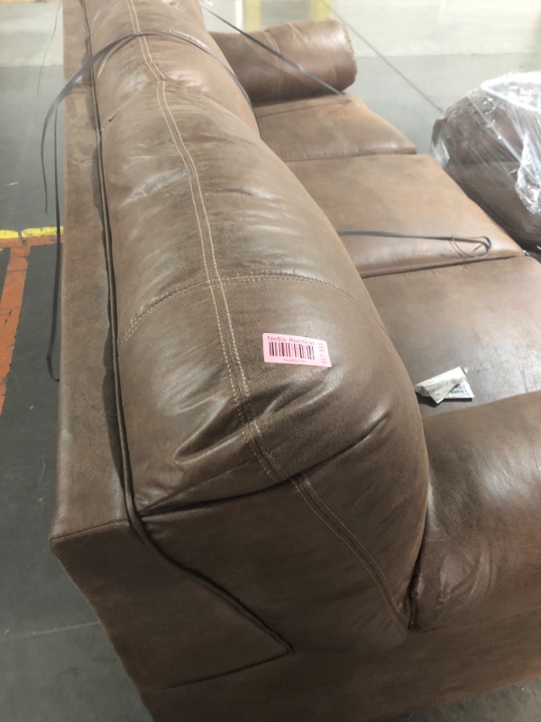 Photo 6 of *** SEE PHOTOS-MINOR HOLE IN THE BACKSIDE OF COUCH-MAJOR DAMAGE TO LOVE SEAT BASE- TRUCK/TRAILER PICKUP ONLY***
Signature Design by Ashley Bladen Faux Leather Full Sofa Sleeper, Brown WITH Signature Design by Ashley Bladen Faux Leather Loveseat, Brown