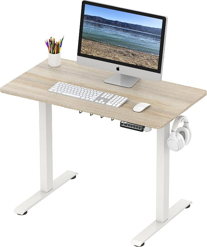 Photo 1 of (NON-REFUNDABLE) SHW Height Adjustable Electric Standing Desk, 40 x 22 Inches Stand up Table White 