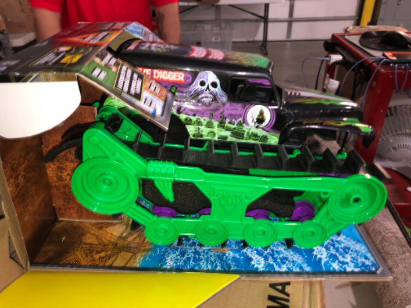 Photo 2 of (NON-REFUNDABLE) Monster Jam, Official Grave Digger Trax All-Terrain Remote Control Outdoor Vehicle