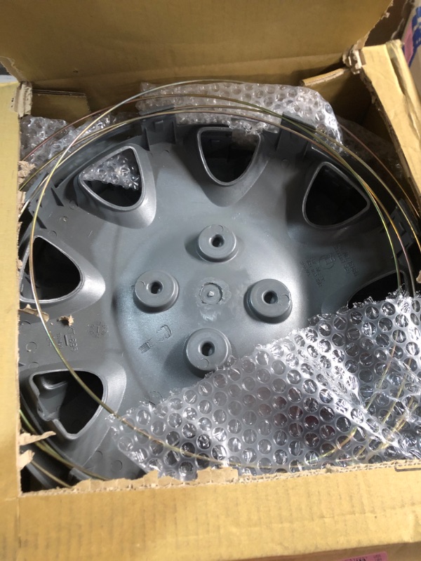 Photo 1 of KT Four ABS Plastic Silver Colored Hubcaps - 14 Inch Diameter