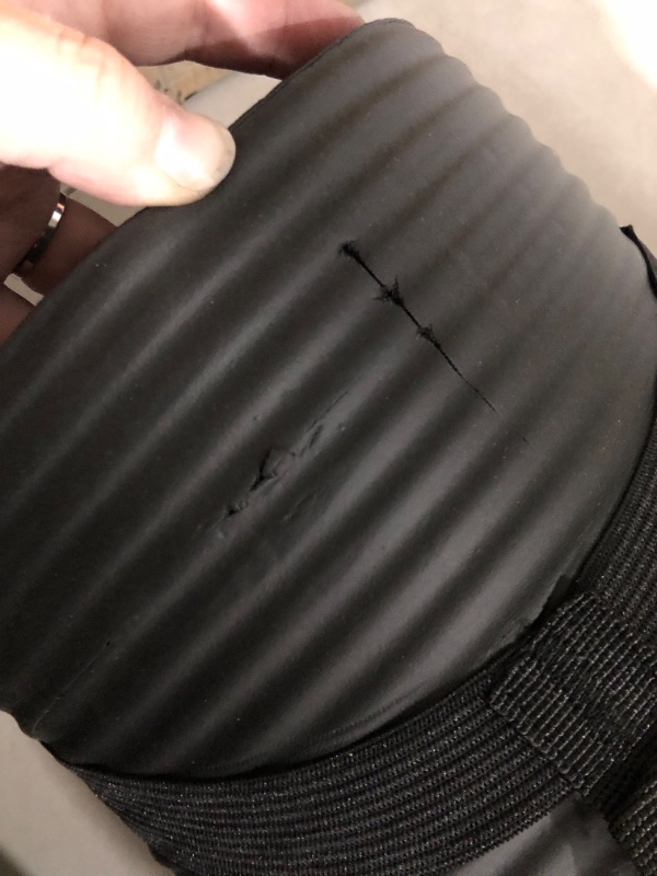 Photo 2 of ***USED*SMALL PUNCTURES IN FOAM NEAR CORNER*INDENTS FROM STRAP*PICTURED***
Amazon Basics Extra Thick Exercise Yoga Gym Floor Mat with Carrying Strap - 74 x 24 x .5 Inches, Black & High-Density Round Foam Roller for Exercise and Recovery - 36 Inch, Black