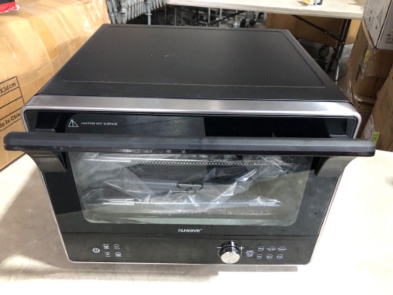 Photo 5 of ***USED - DIRTY - POWERS ON - UNABLE TO TEST FURTHER***
Nuwave TODD ENGLISH iQ360 Digital Smart Oven, 20-in-1 Convection Infrared Grill Griddle Combo, 34-Qt Mega Capacity, 1800 Watts, Adjustable Triple Surround Heat Zones, Smart Thermometer, WIFI Enabled