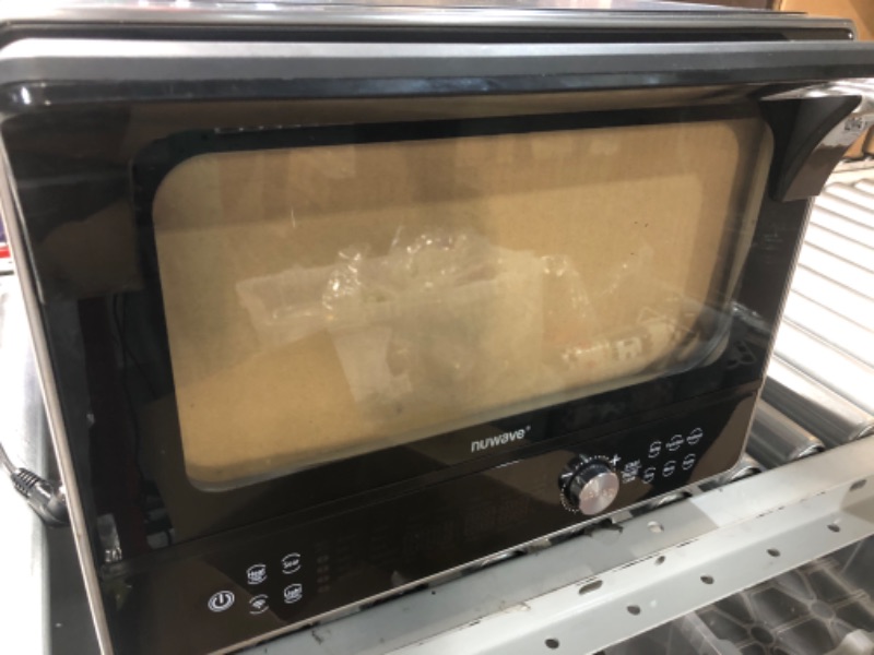 Photo 2 of ***USED - DIRTY - POWERS ON - UNABLE TO TEST FURTHER***
Nuwave TODD ENGLISH iQ360 Digital Smart Oven, 20-in-1 Convection Infrared Grill Griddle Combo, 34-Qt Mega Capacity, 1800 Watts, Adjustable Triple Surround Heat Zones, Smart Thermometer, WIFI Enabled