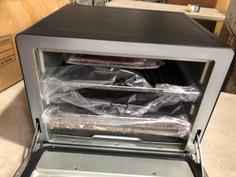 Photo 9 of ***USED - DIRTY - POWERS ON - UNABLE TO TEST FURTHER***
Nuwave TODD ENGLISH iQ360 Digital Smart Oven, 20-in-1 Convection Infrared Grill Griddle Combo, 34-Qt Mega Capacity, 1800 Watts, Adjustable Triple Surround Heat Zones, Smart Thermometer, WIFI Enabled