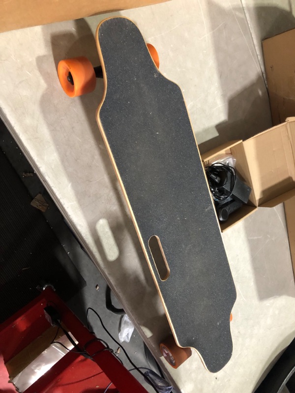 Photo 4 of ***NOT FUNCTIONAL - DOESN'T POWER ON OR CHARGE - UNABLE TO TROUBLESHOOT***
Caroma Electric Skateboards for Adults Kids, 350W Electric Longboard with Remote, 12.4MPH Top Speed, 8 Miles Max Range Orange-350W