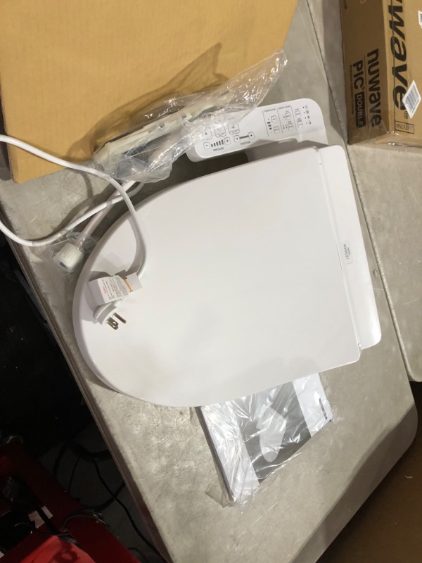 Photo 8 of ***USED - MISSING HARDWARE - POWERS ON - UNABLE TO TEST FURTHER***
TOTO WASHLET A2 Electronic Bidet Toilet Seat with Heated Seat and SoftClose Lid, Elongated, Cotton White - SW3004#01