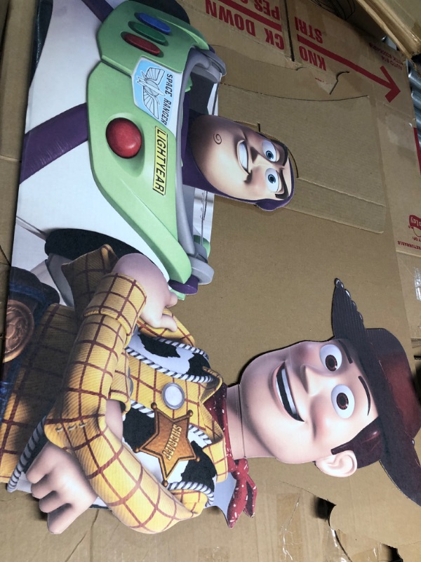 Photo 2 of **General post and photo for reference**
Large cardboard cut out of buzz lightyear and woody 