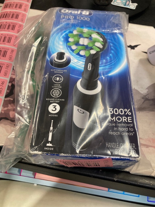 Photo 2 of 1000 CrossAction Electric Toothbrush