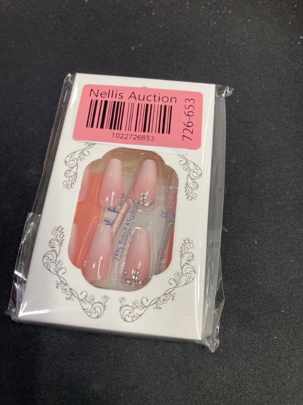 Photo 2 of Acrylic Press on Nails Medium Coffin Pink White Gradient Fake Nails Press ons Silver Rhinestones and Broken Diamond Glue on Nails Glossy Artificial Stick on Nails for Women 24Pcs