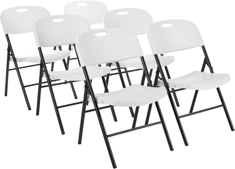 Photo 1 of  Basics White Folding Chair for Extra Seating | Plastic | 350-Pound | 6-Pack