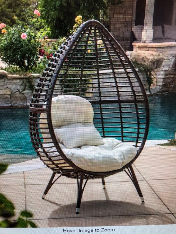 Photo 1 of Cutter Multi-Brown Teardrop Faux Rattan Outdoor Patio Lounge Chair with Beige Cushion
