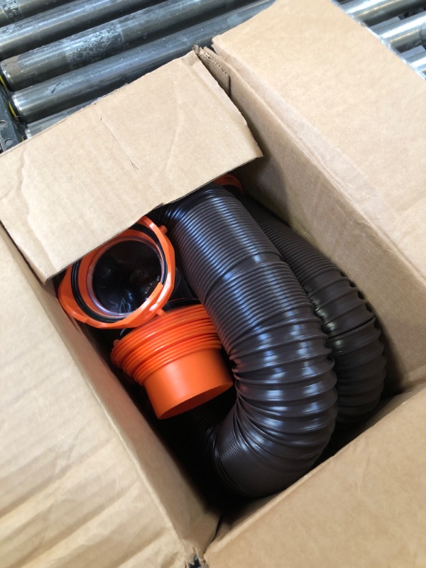 Photo 3 of Camco RhinoFLEX 15Ft Sewer Hose Kit — Includes 4-in-1 Adapter, Clear Elbow, & Caps — Connects to 3? Slip & 3?, 3 1/2?, 4? NPT Threaded Sewer Connections (39770)
