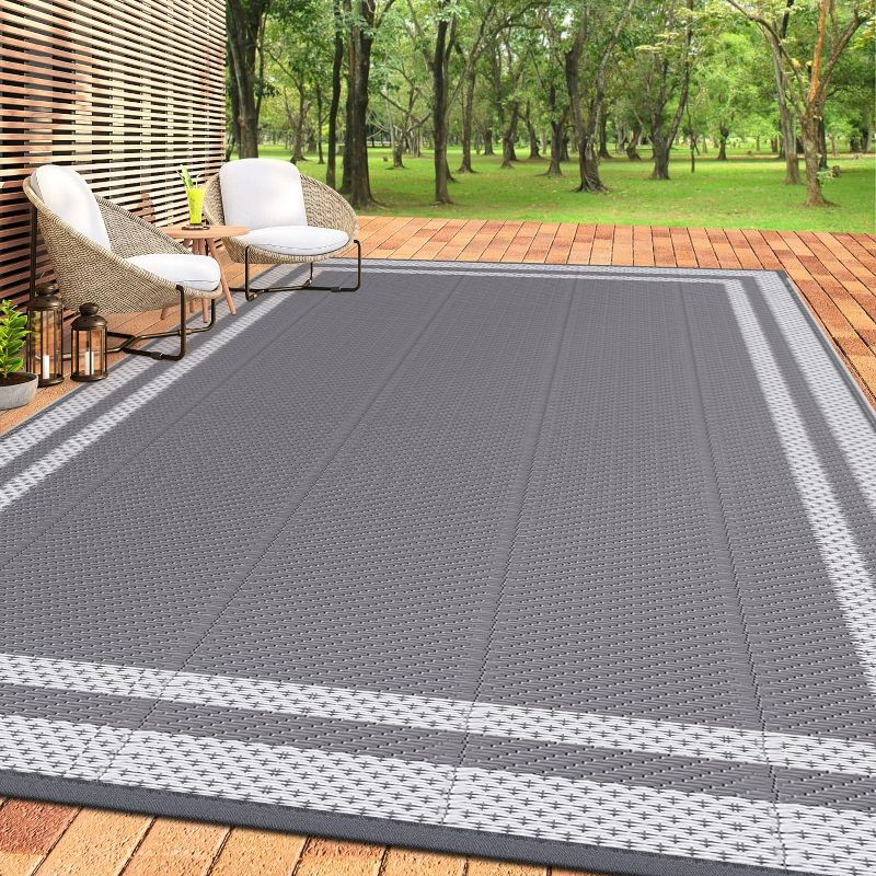 Photo 1 of HappyTrends,Outdoor Rug,Patio Rug,Reversible Portable Plastic Straw Rug,Camping Rugs for Outside RV,Large Waterproof Area Rugs for Patio,Deck,Picnic,Porch,Balcony(6'x 9',White&Gray)