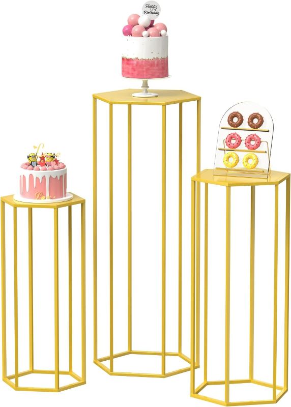 Photo 1 of Cylinder Stand Hexagon Gold Pedestal Stand for Party 3Pcs Metal Plant Stand Tall Cake Cylinder Pedestal Stand for Wedding Flower Vase Living Room Patio Decoration