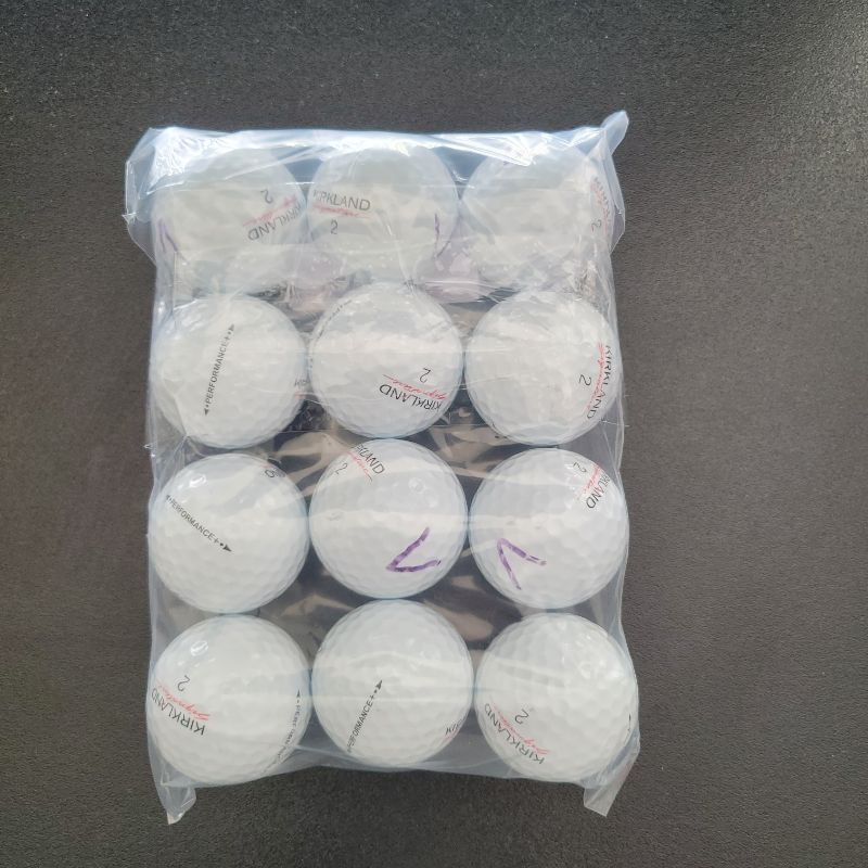 Photo 1 of ** SINGLE USE TEST ** Kirkland Signature Golf Balls has a soft urethane cover that reduces spin rate for longer drives and improves durability for longer play. The low compression, highly elastic rubber core delivers a soft feel with high speed; while the